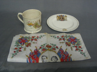 An   Edward   VII   Coronation  mug,  a   George   VI   souvenir Coronation  handkerchief   and a Queen Elizabeth  II  Coronation   plate
