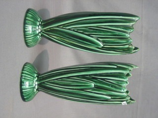 A pair of Sylvac green glazed vases in the form of reeds, the base marked Sylvac 2452 9"