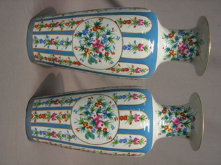 A  pair  of 20th Century Sevres style porcelain vases  with  green and gilt decoration 14"