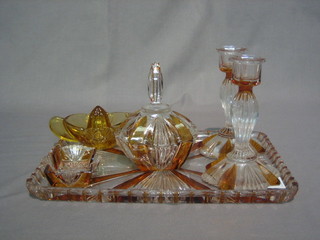A brown and clear glass dressing table set and a pottery  dressing table set (2)