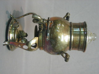 A  silver  plated  twin handled  coffee  percolator  complete  with burner