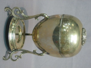 An oval silver plated egg boiler (burner missing)