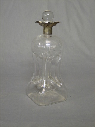 A  Victorian  pinched glass decanter with  silver  collar,  London 1894 (decanter cracked)