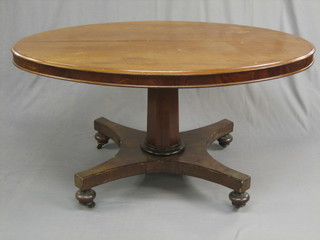 A  Victorian  oval  mahogany Loo table,  raised  on  a  chamfered column and triform base 56"