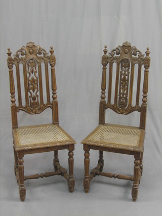 A set of 6 19th Century Continental carved oak high back  dining chairs with woven cane seats, raised on turned and block supports