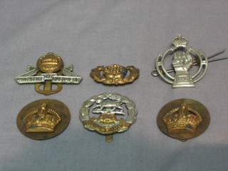 A  Hampshire  Regt.  cap badge, a Royal  Armoured  Corps  cap badge, a Lancashire Fusiliers cap badge (f) and 2 crowns 