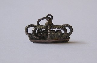 A Russian style pierced silver crown pendant