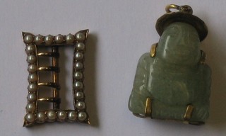 A  green  hardstone  pendant  in  the  form  of  a  seated  Buddha together with a 15ct gold buckle set demi-pearls