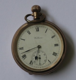 An  open  faced  pocket  watch contained in  a  gold  plated  case