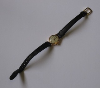 A  lady's  Longines wristwatch, movement signed  Longines,  17 jewels, Swiss contained in an 18ct gold case