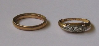 An  18ct  gold dress ring set diamonds together with  a  9ct  gold wedding band (2)