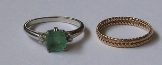 A  lady's  18ct white gold dress ring set a  green  coloured  stone together with a gold band (2)