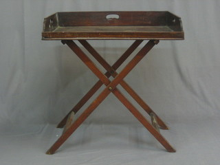 A rectangular mahogany butler's tray complete with folding stand (crack to tray) 29"