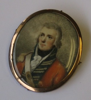 An 18th Century portrait miniature on ivory of an Officer of  The 55th Infantry, contained in a gilt metal brooch mount, the reverse with gilt monogramme AMD