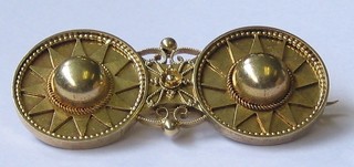 A Victorian gilt metal brooch