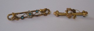 A gilt metal bar brooch and 1 other (1f)