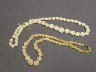 2 strings of carved ivory beads