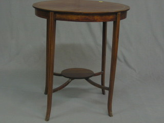 An Edwardian oval inlaid mahogany 2 tier occasional table raised on outswept supports 24"