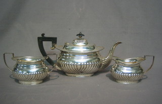 A  Georgian  style silver plated 3 piece tea service  of  oval  form comprising   teapot,  twin  handled  sugar  bowl  and  cream   jug