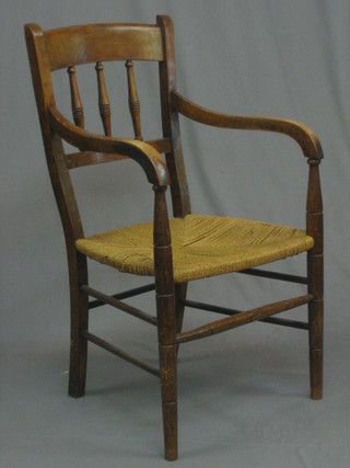 A  19th  Century  beech and elm stick and bar  back  carver  chair with woven rush seat 