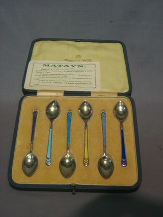 A  set  of  6 silver gilt and enamel coffee  spoons  by  Mappin  & Webb, Sheffield 1911 