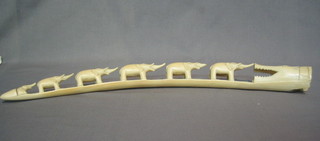 A carved ivory bridge of elephants 20" (chip to base)