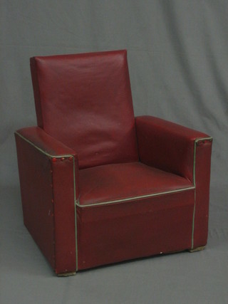 A  1940's  upholsterer's  shop display fitting in  the  form  of  an armchair upholstered in red rexine 19"