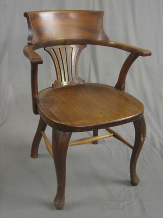 An  Edwardian mahogany tub back chair with pierced  vase  splat back and solid seat, raised on cabriole supports