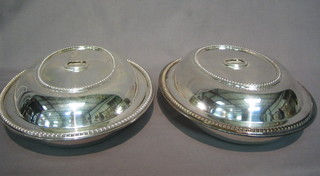 A  pair of oval silver plated entree dishes and covers 12" (no  lid)