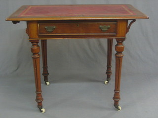 A  Victorian mahogany writing table with inset tooled red  leather top,  fitted  a  drawer, raised on turned and  fluted  supports  35"