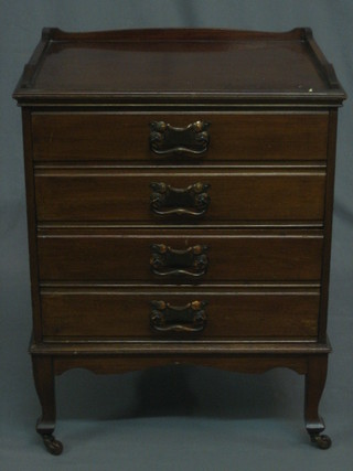 An Edwardian mahogany 4 drawer music chest with three-quarter gallery raised on cabriole supports 18"