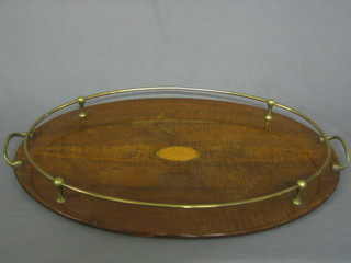 An  Edwardian oval inlaid mahogany twin handled tea  tray  with brass gallery 23"