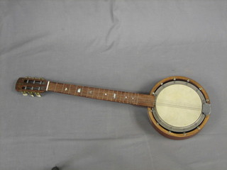 A  6  stringed  banjo with 9" drum and surrounded  by  12  bolts, with solid back