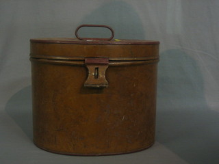 An oval pressed metal hat box 13"