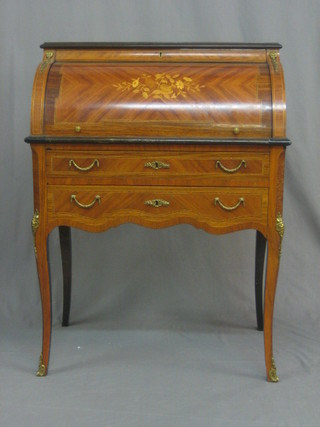 A   20th  Century  French  inlaid  and  crossbanded  King   wood cylinder  bureau  with well fitted interior above 2  long  drawers, raised   on  cabriole  supports  with  metal   embellishments   39"