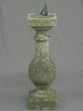 A  metal  octagonal  sun dial 6" raised  on  a  stoneware  baluster column 25"