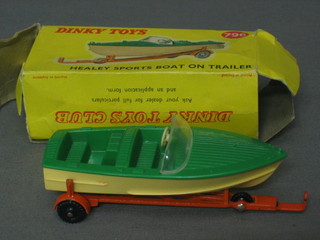 A  Dinky  Toy  796  Healey sports boat  on  trailor,  boxed  (box  dented and damaged)