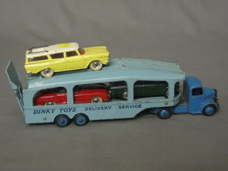 A  Dinky  Bedford car transporter, a Dinky  168  Singer  Gazette motor car, a Dinky Volkswagon Kamann motor car and a  Dinky Ramble Cross Country motor car, all unboxed