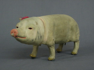 A 19th Century automaton figure of a walking pig (missing 1 ear) 11"