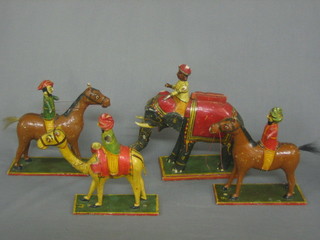 2 Indian painted wooden figures of horseman 6", 1 of an elephant and 1 of a camel rider 7" (f)