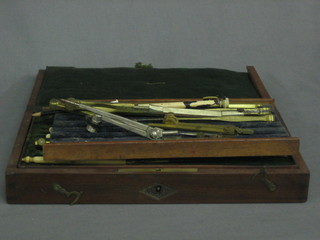 A  part 19th Century geometry set contained in a mahogany  case