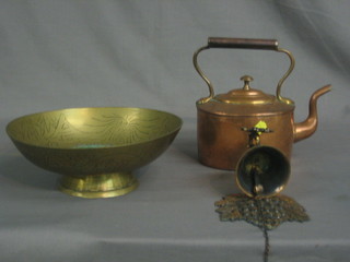 An oval copper kettle 7", an Eastern brass bowl 10" and a  metal hanging bell