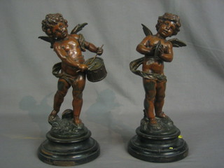 A  pair  of  19th  Century spelter figures in  the  form  of  cherub playing cymbals and a cherub playing drums 11"