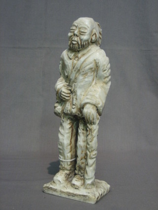 An Eastern carved stone figure of  a standing man 12"