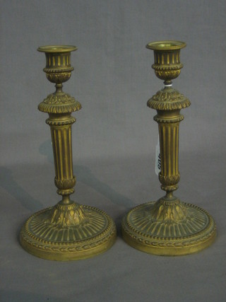 A  pair of 19th Century Empire style gilt metal candlesticks  with detachable sconces 9" 