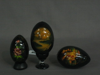 3 20th Century Russian lacquered and painted model eggs