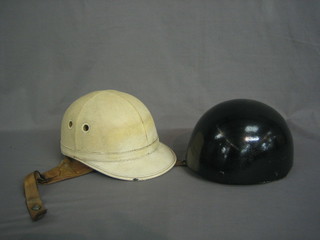 A  Norton motorcycle helmet and an Everoak motorcycle  helmet