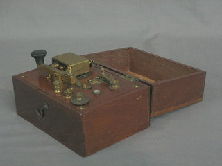An old Morse key contained in a mahogany case