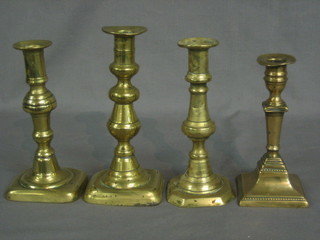 4 various brass candlesticks