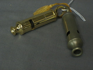 A  gilt metal Metropolitan pattern police whistle to  commemorate the Centenary of the Royal Hong Kong Police and 1 other whistle